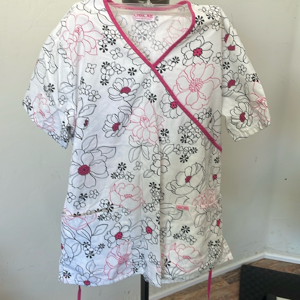 cherokee floral design scrub top with pink trim